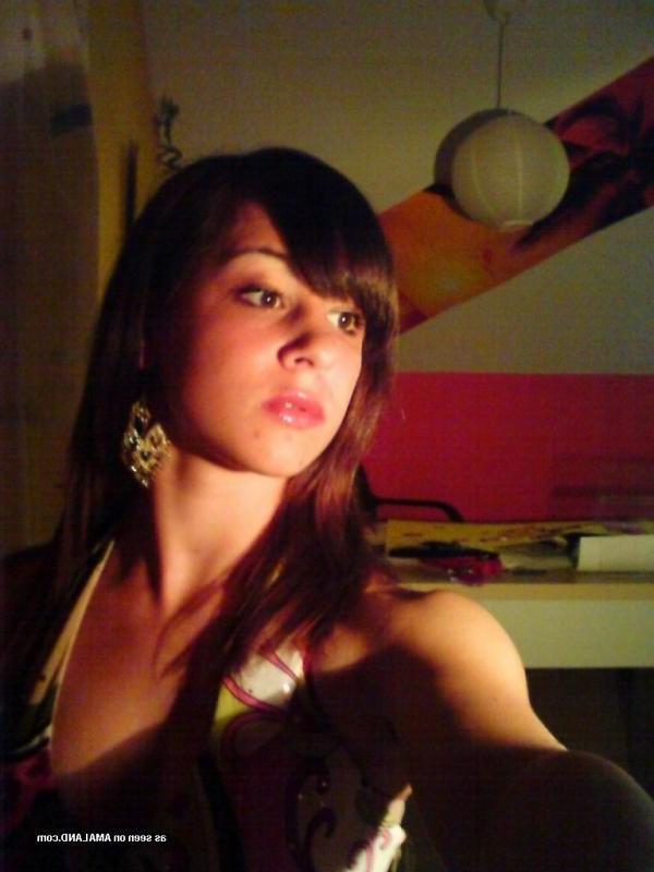 14P Hottie shows off her yummy cleavage in a tight tank top