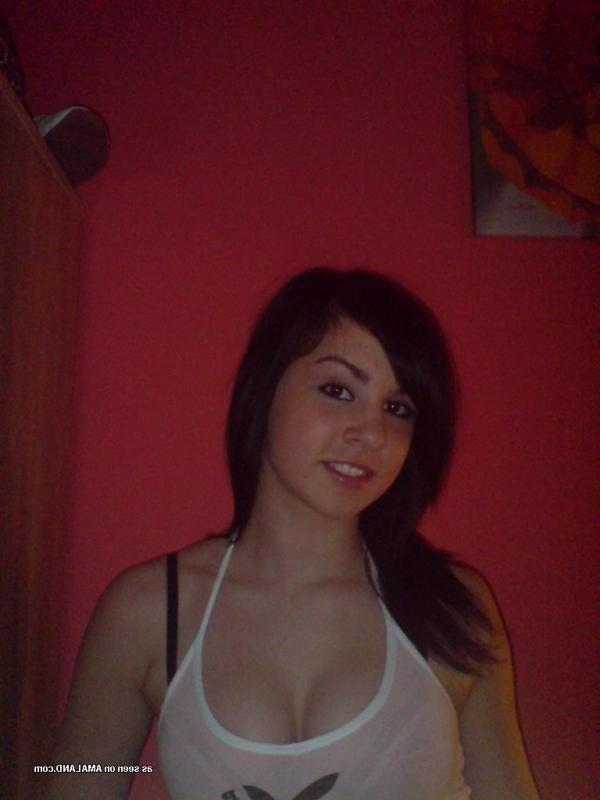 14P Hottie shows off her yummy cleavage in a tight tank top