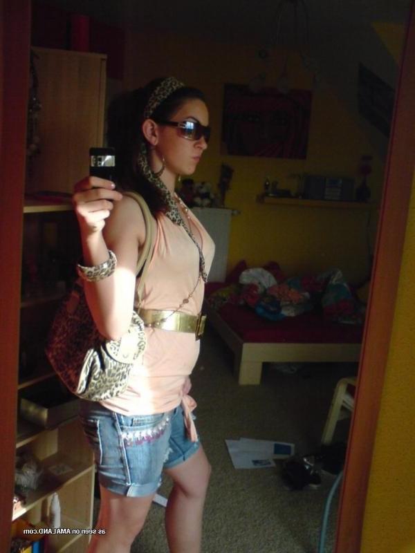 14P Hottie shows off her yummy cleavage in a tight tank top