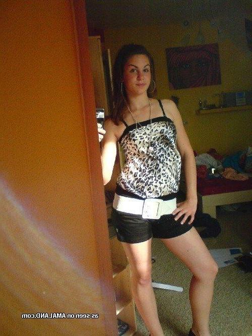 14P Hottie shows off her yummy cleavage in a tight tank top