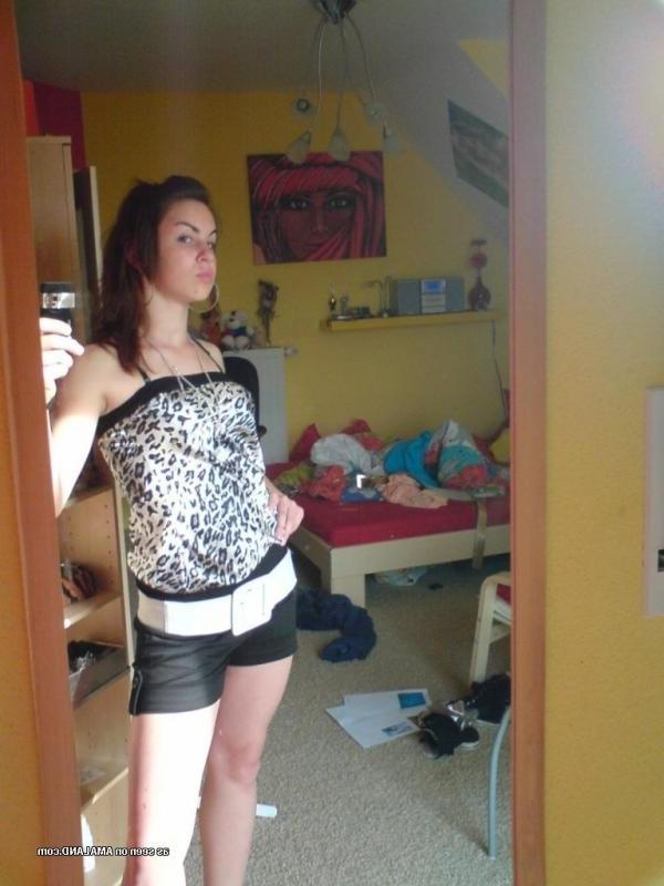 14P Hottie shows off her yummy cleavage in a tight tank top