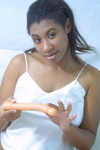 17P Ebony babe make toy wet before penetration