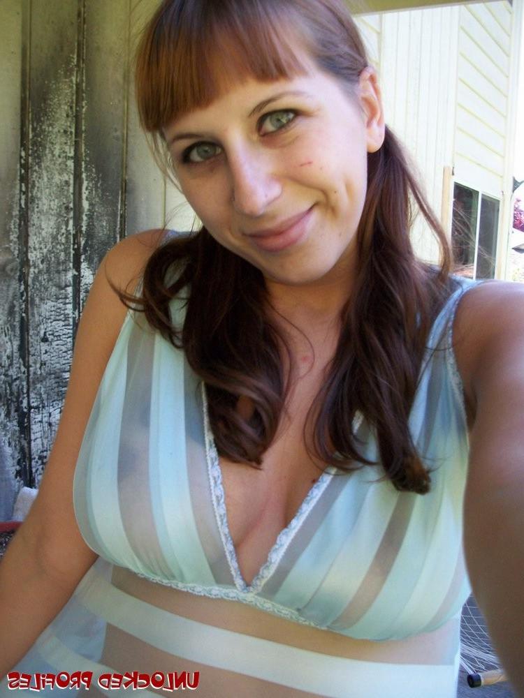 15P Olive showing off her big knockers and trimmed pussy outdoors