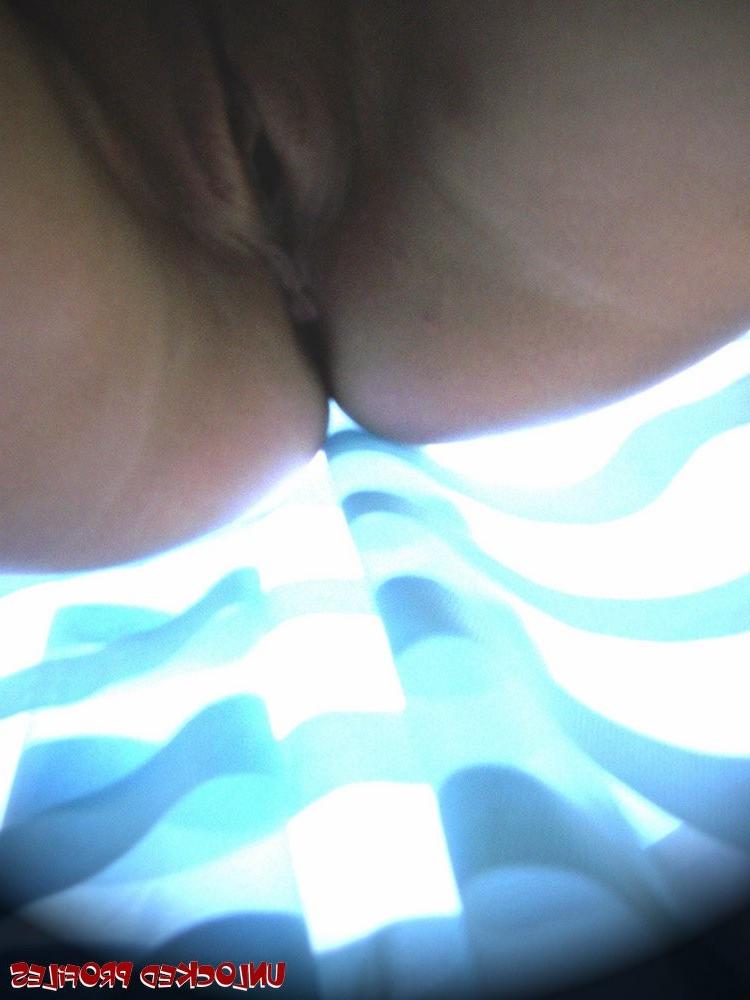 15P Olive showing off her big knockers and trimmed pussy outdoors