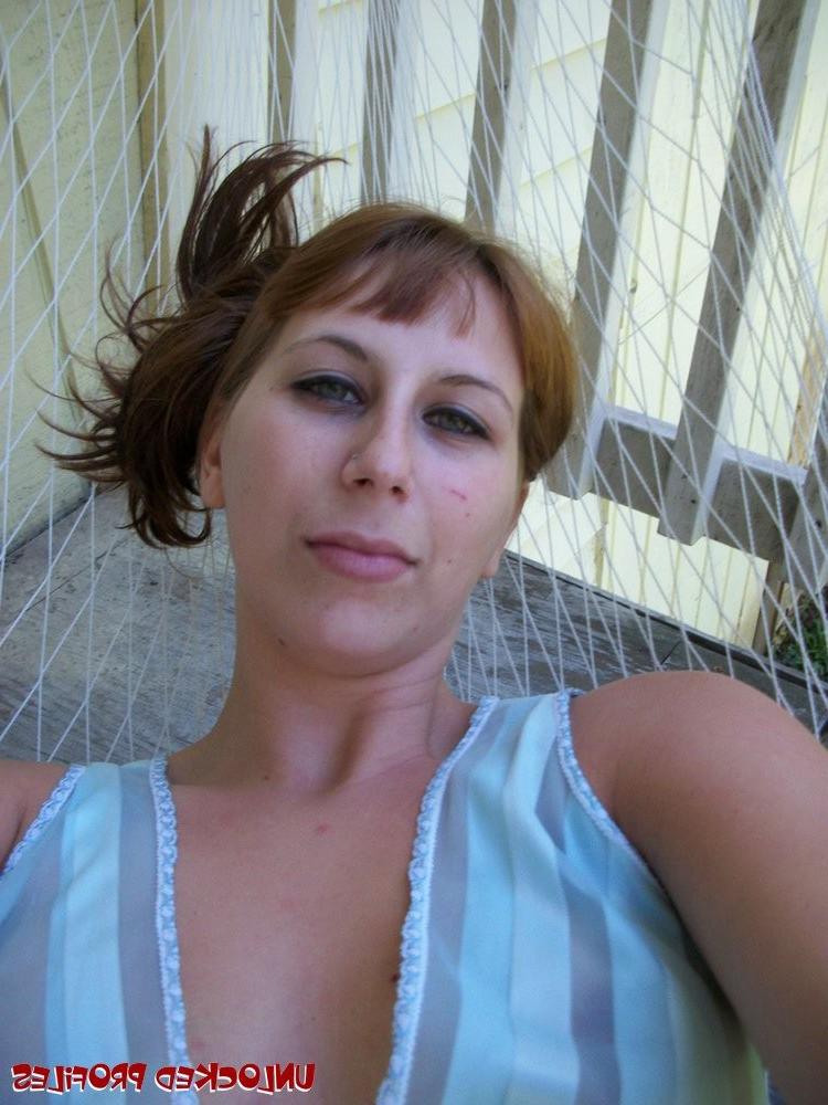 15P Olive showing off her big knockers and trimmed pussy outdoors