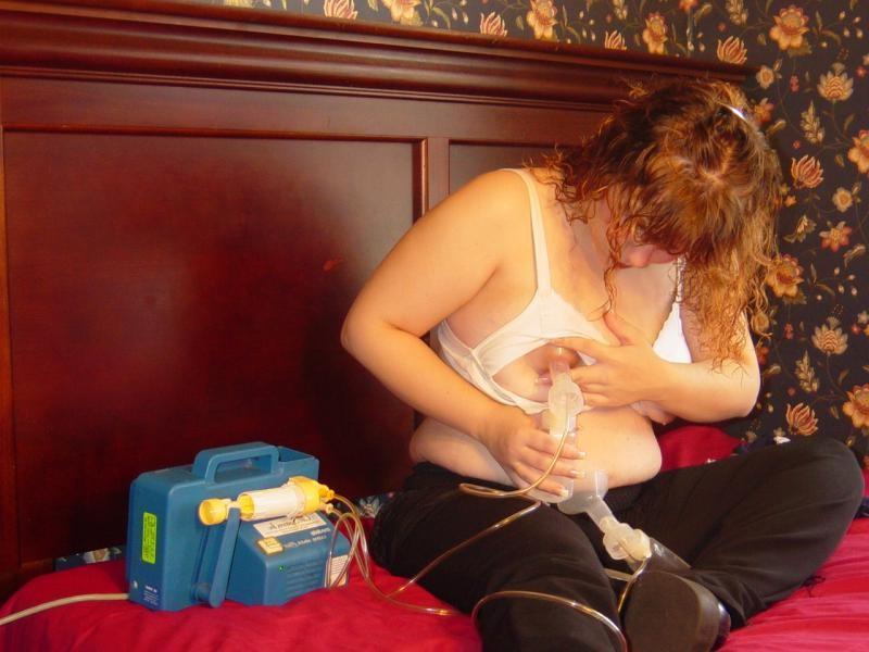 16P Lactating babe milking tits