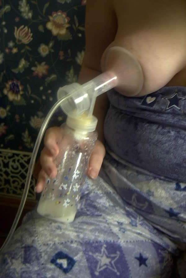 16P Lactating babe milking tits