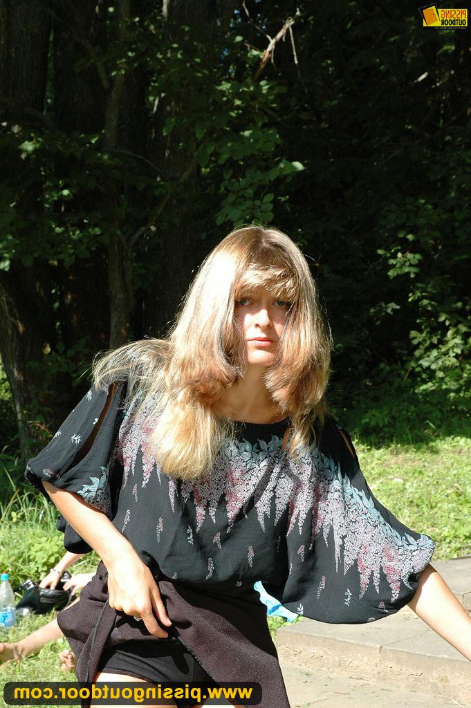 18P Pissing fetish milf pisses on the park bench