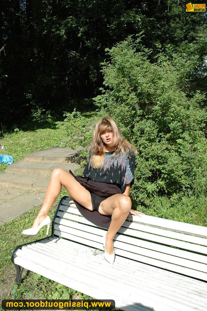 18P Pissing fetish milf pisses on the park bench