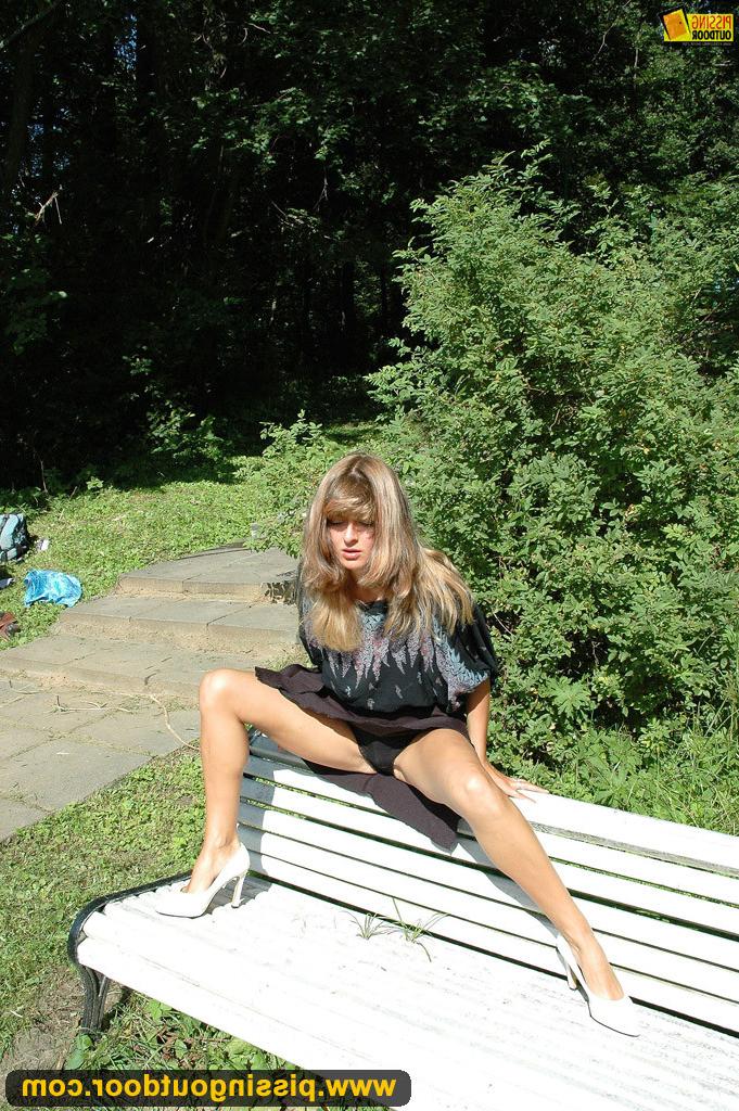 18P Pissing fetish milf pisses on the park bench