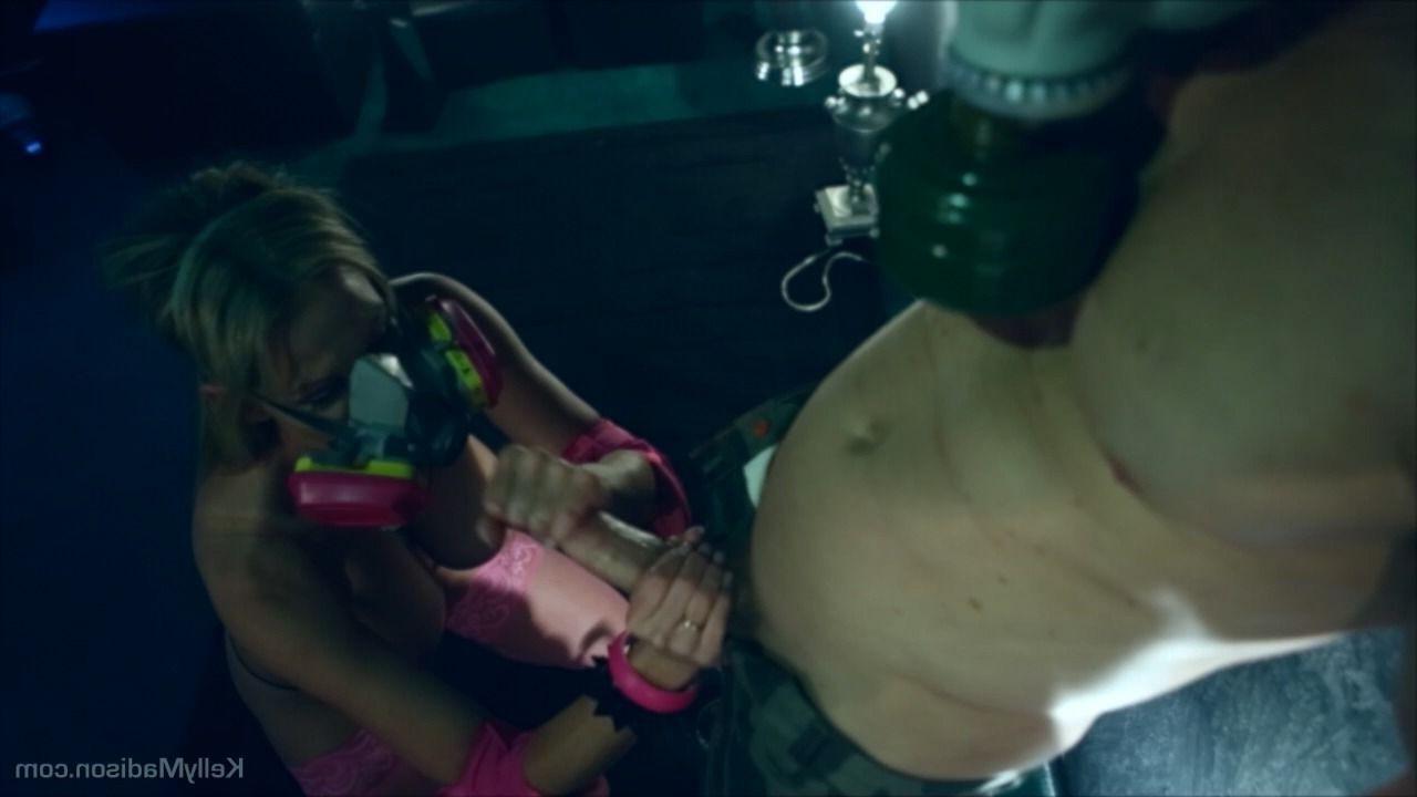 16P Busty Kelly Madison rubs a cock in a hazard suit