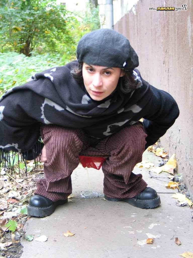 16P Slut peeing on a sidewalk