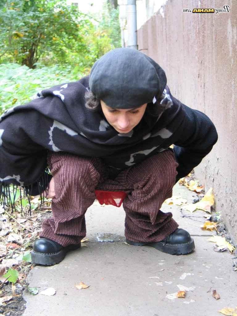 16P Slut peeing on a sidewalk