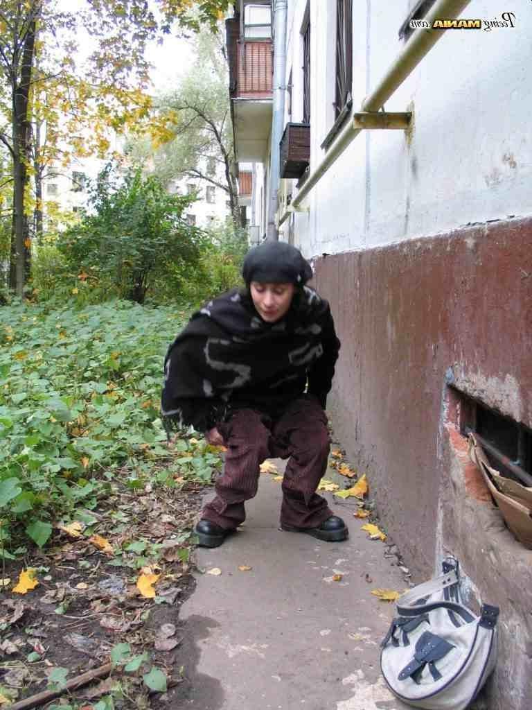 16P Slut peeing on a sidewalk