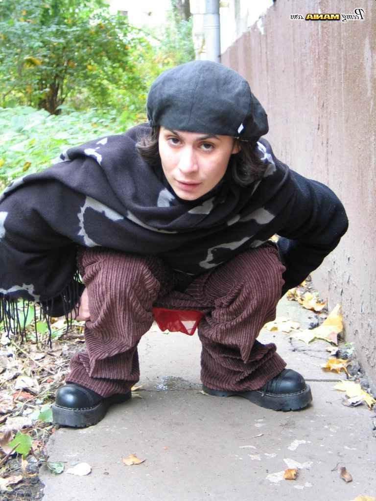 16P Slut peeing on a sidewalk