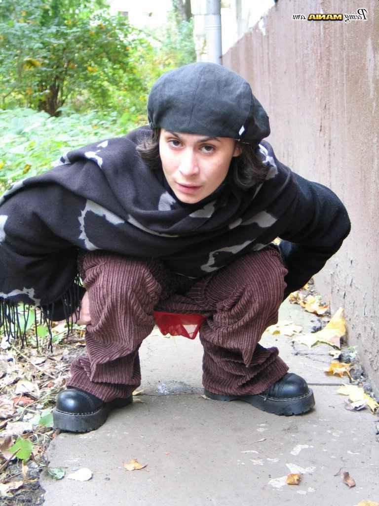 16P Slut peeing on a sidewalk