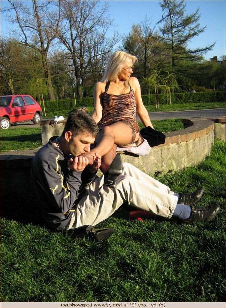 12P Leggy mistress and her slave in kinky public femdom action
