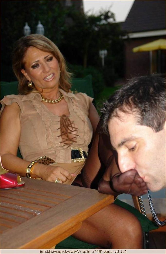 12P Lady in stockings foot dominating