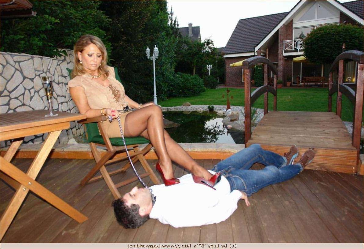 12P Lady in stockings foot dominating