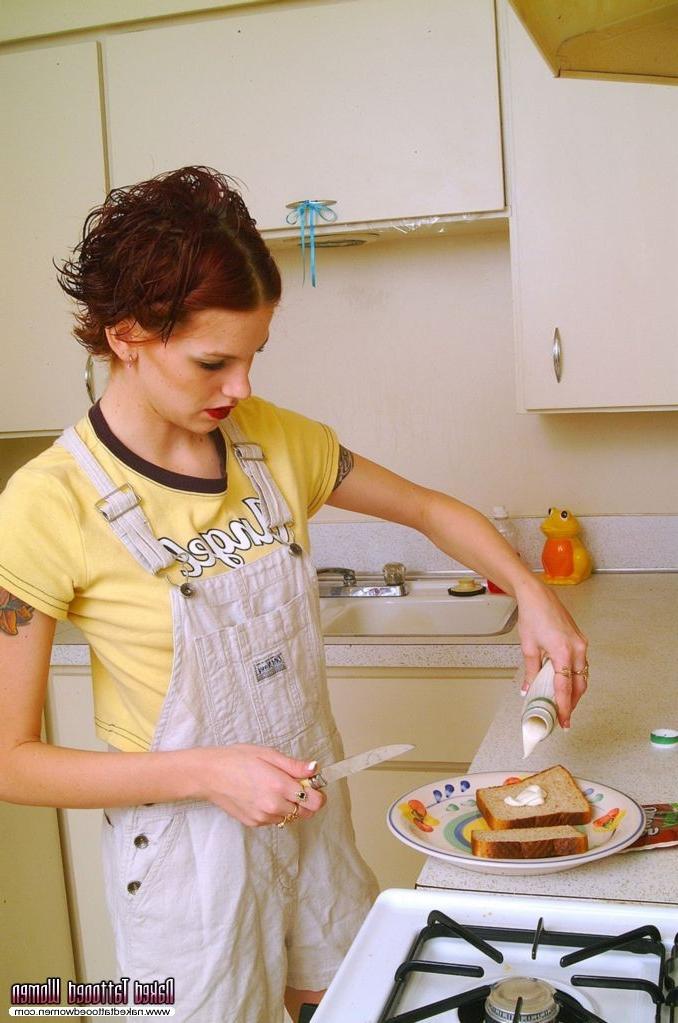 16P Tattooed Redhead Gets Naked in the Kitchen