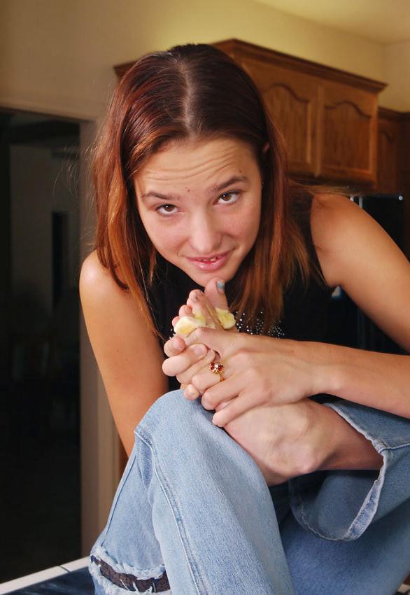 20P Sweet redhead teen sucking her feet