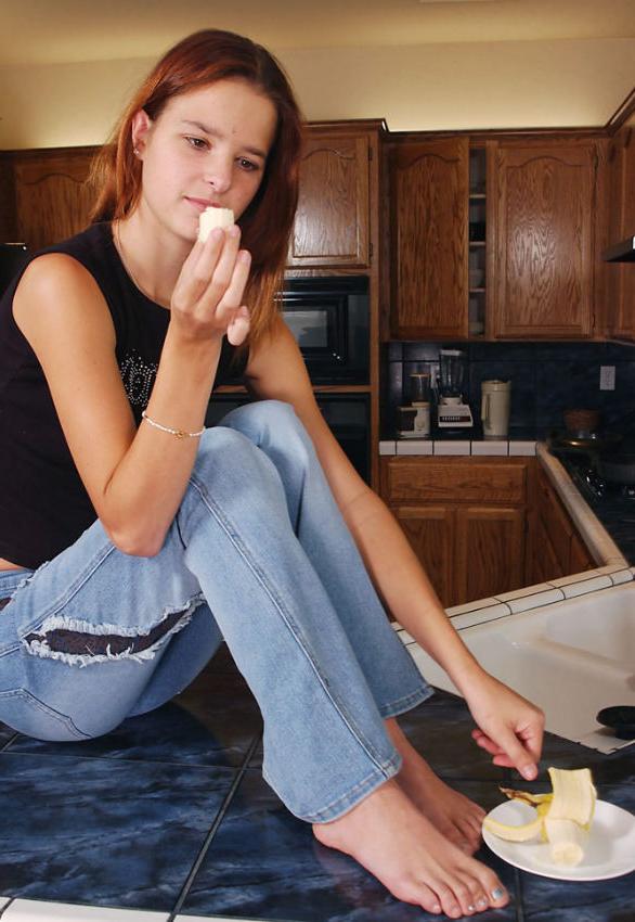 20P Sweet redhead teen sucking her feet