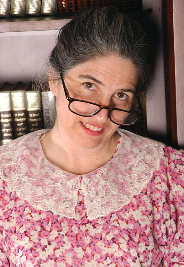 20P Horny granny shows pussy in library