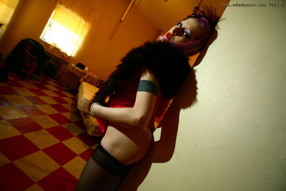 16P A tattood neo goth babe with perky pierced nipples