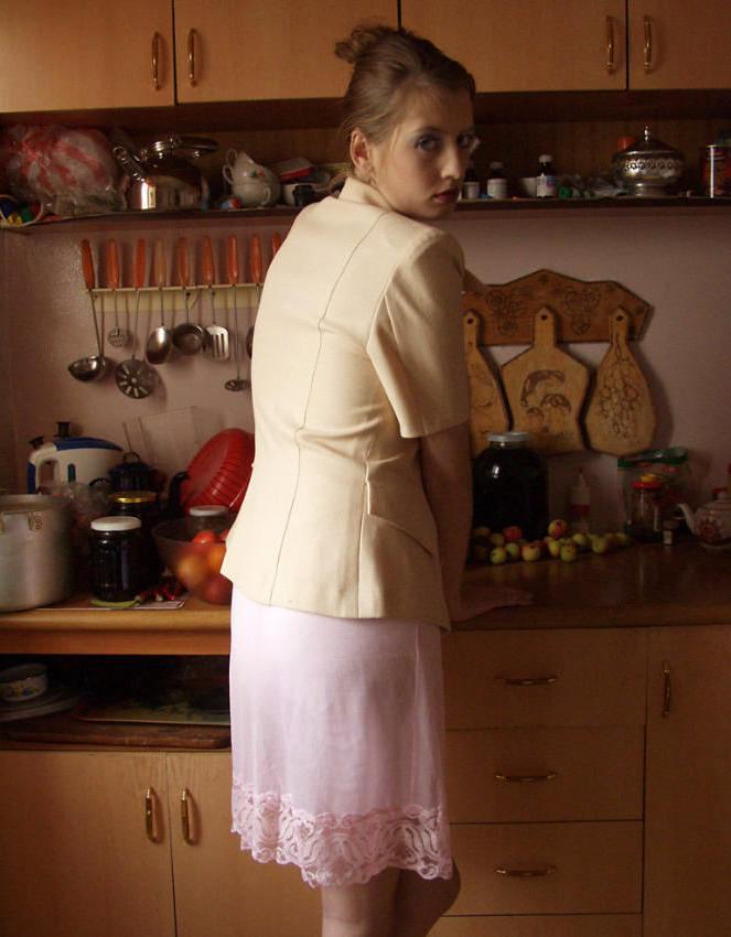 20P Busty preggo girl posing in kitchen