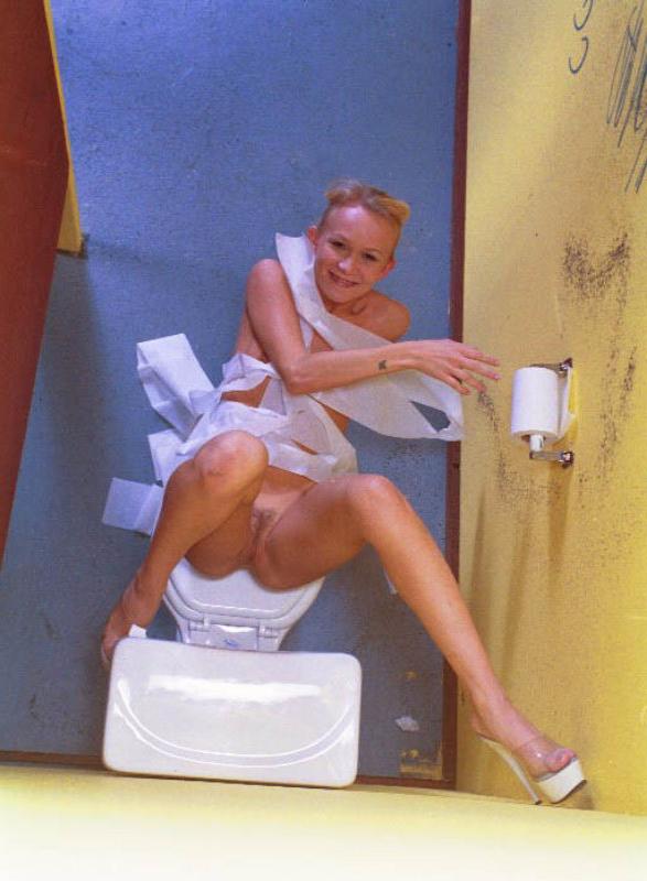 20P Blonde slut posing in public toilet