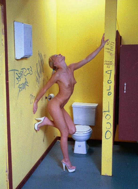 20P Blonde slut posing in public toilet