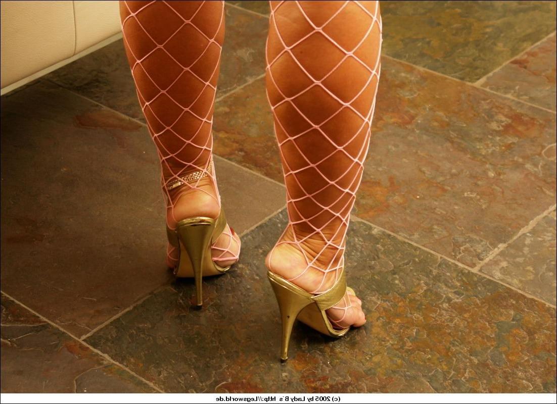 11P Leggy fetish lady in white fishnets shows her tasty feet