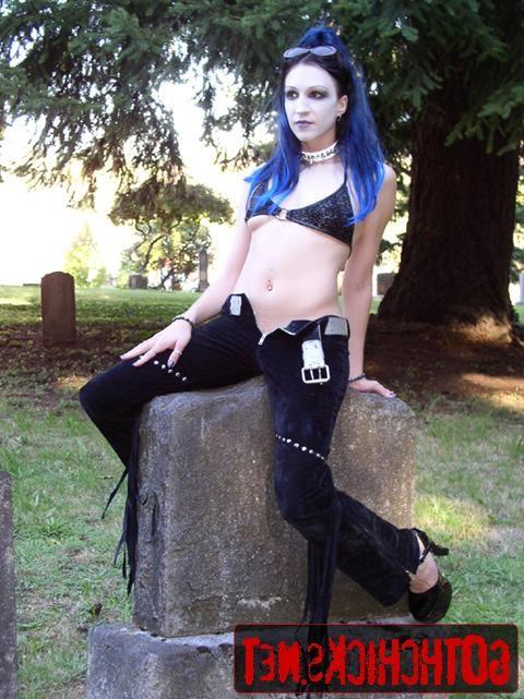 17P Goth poses on a cemetery