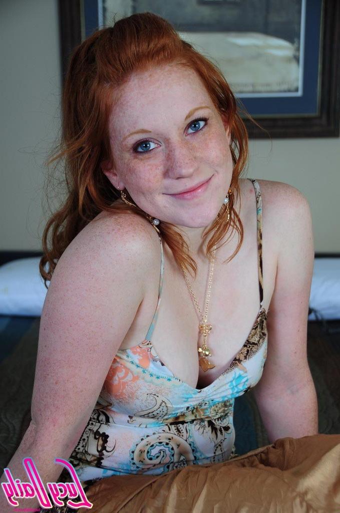 16P Pale redhead girl joking topless