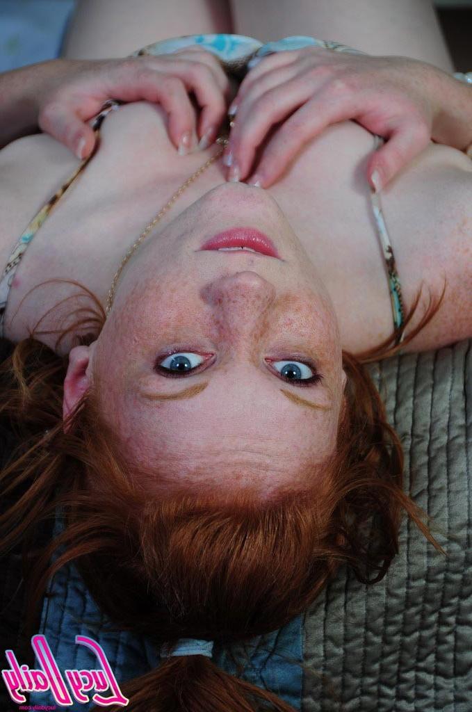 16P Pale redhead girl joking topless