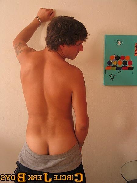 14P Cute twink with a tat lets his cock hang out