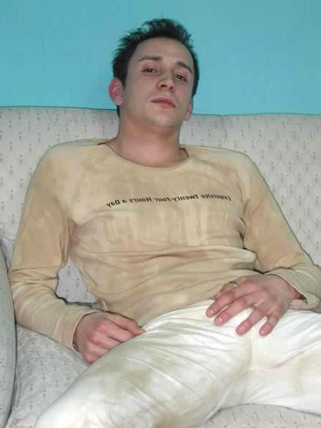 13P Cute twink undressing in a living room