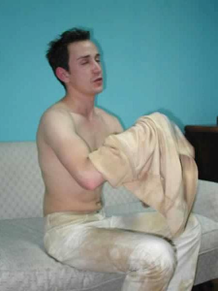 13P Cute twink undressing in a living room