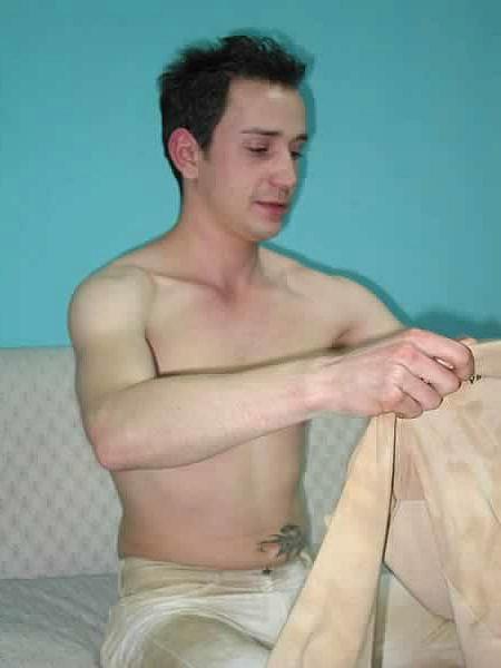 13P Cute twink undressing in a living room