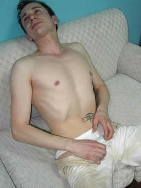 13P Cute twink undressing in a living room