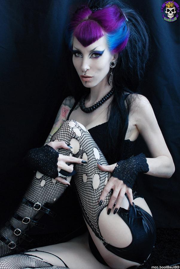 15P Gothic pinup superstar in torn fishnets and purple hair