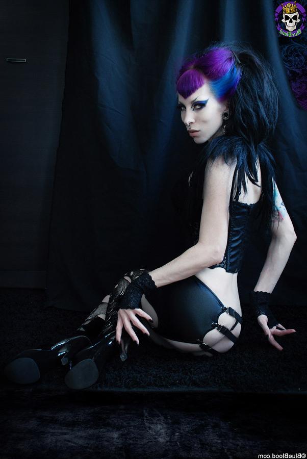 15P Gothic pinup superstar in torn fishnets and purple hair