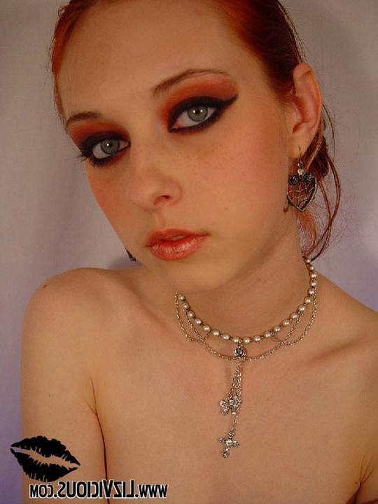 16P Redhead goth teen with sexy make up showing her skinny body
