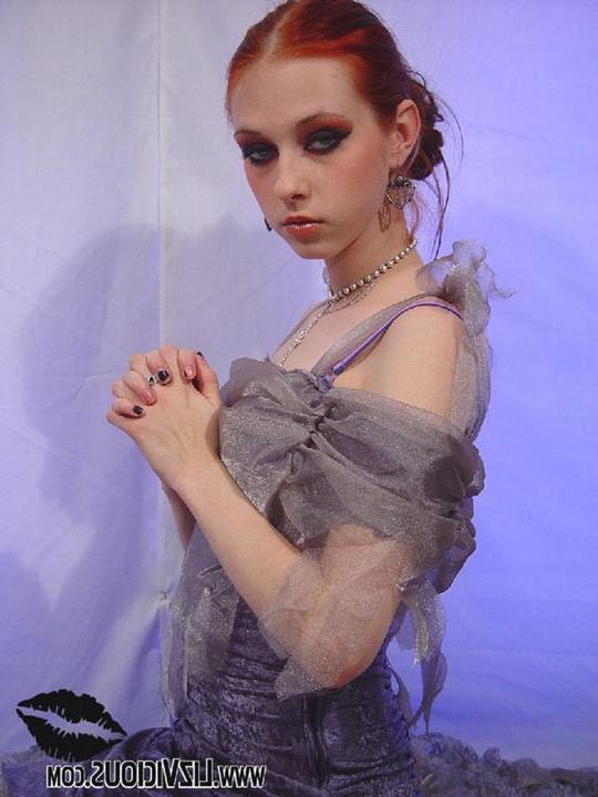 16P Redhead goth teen with sexy make up showing her skinny body