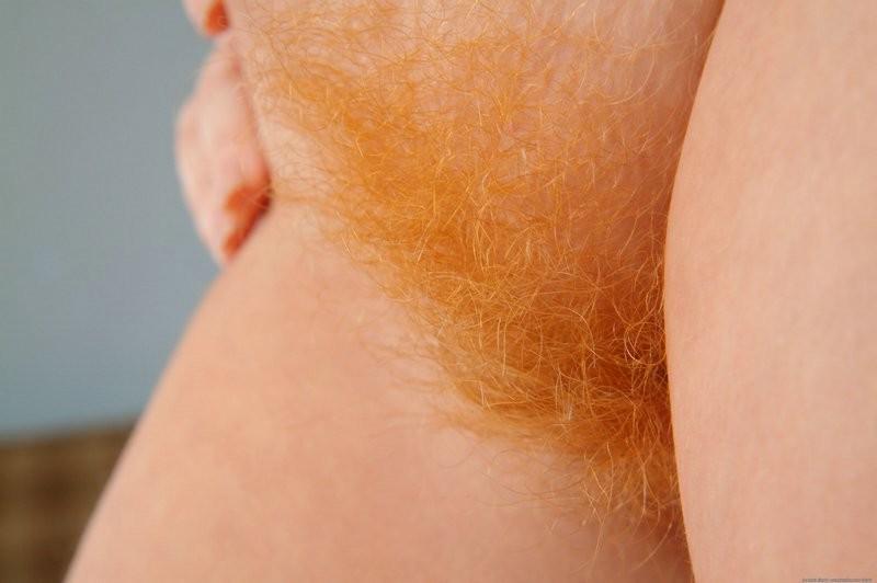 15P Redhead Jess shows off her hairy coochy