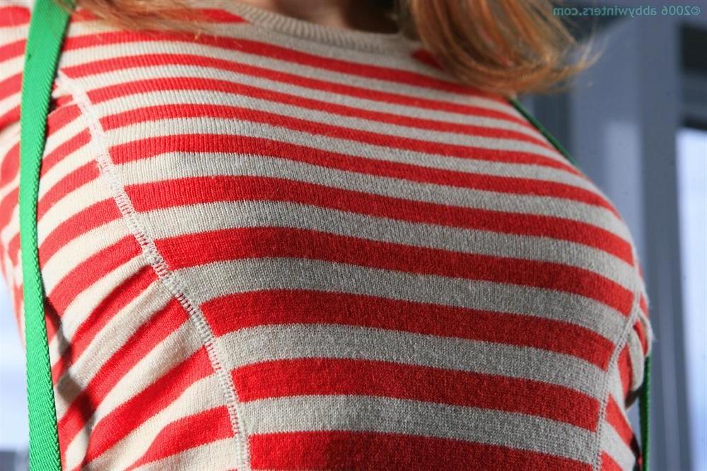 16P A busty redhead amateur teen exposes her bushy ginger pussy