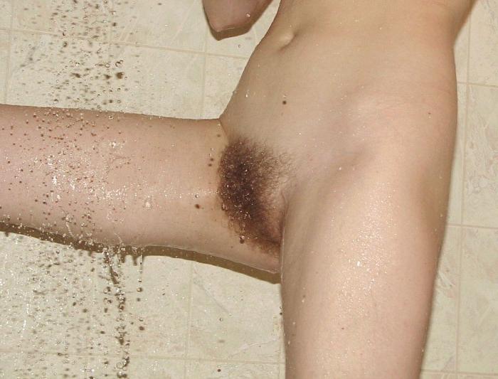 16P Redhead in shower washing her hairy pussy
