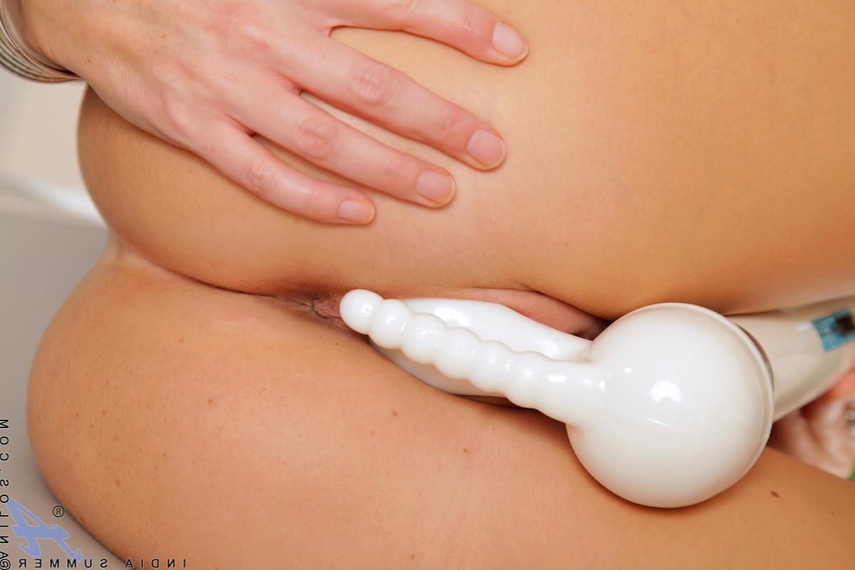 15P Classy Anilos milf in a hot table top show fucking her magic wand toy