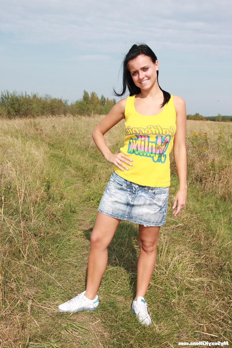 16P Teen hottie goes naked in nature and stuffs pussy