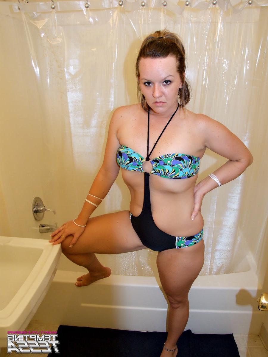 16P Horny housewife lets us take a peek at her showering